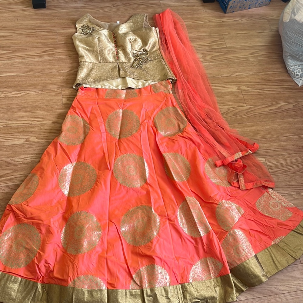 Orange and Gold Lehengha. Never worn. Was too small then too big.🙁 Gorgeous. XL.